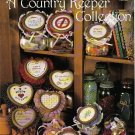 A COUNTRY KEEPER COLLECTION ** counted cross stitch A COUNTRY KEEPER COLLECTION ** counted cross stitch