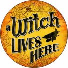 A Witch Lives Here Novelty Small Metal Circular Sign