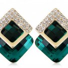 0.50 Carat  diamond with green emerald Earring studs in 18 Karat yellow gold