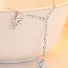 0.20 carat diamond bracelet with hanging Star and half moon 18 karat gold