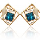 0.25 Carat  diamond with Square Deep Sea Blue studs in 18 Karat yellow gold