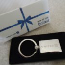 United Airlines UAL Win As One Silver Toned Key Chain Key Ring w/Globe Logo NIB United Airlines UAL Win As One Silver Toned Key Chain Key Ring w/Globe Logo NIB