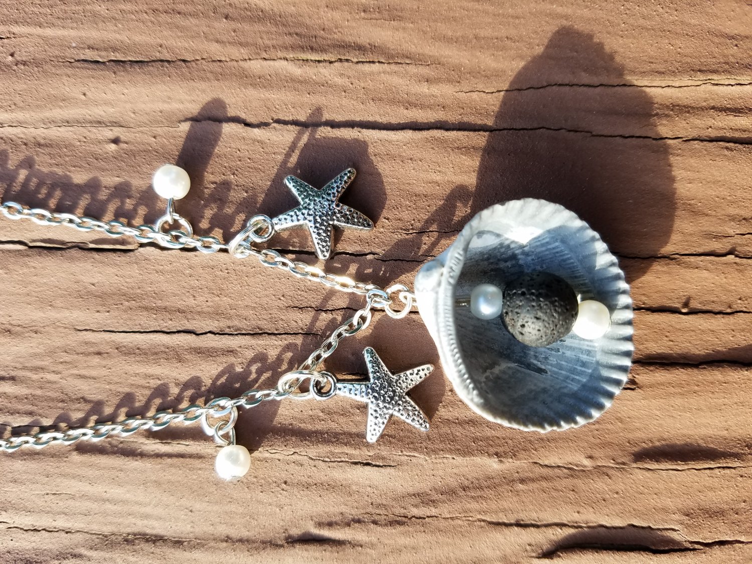 Shell aromatherapy lava rock necklace