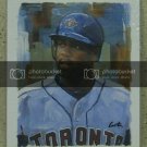2003 Playoff Portraits Materials Gold #70 Carlos Delgado Jsy/25