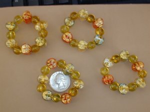 Hand beaded Napkin Rings Gold Red Blue Set of 4