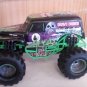 GRAVE DIGGER 4 TIME CHAMPION 4 X4 BACK TO THE BONE SCALE 1:64 DIECAST BIG TOY