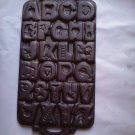 8 X 13”vtg OLD  IRON CASTER  JOHN WRIGHT 1985  ABC COOKIE BAKER-SYMBOLICAL ABC