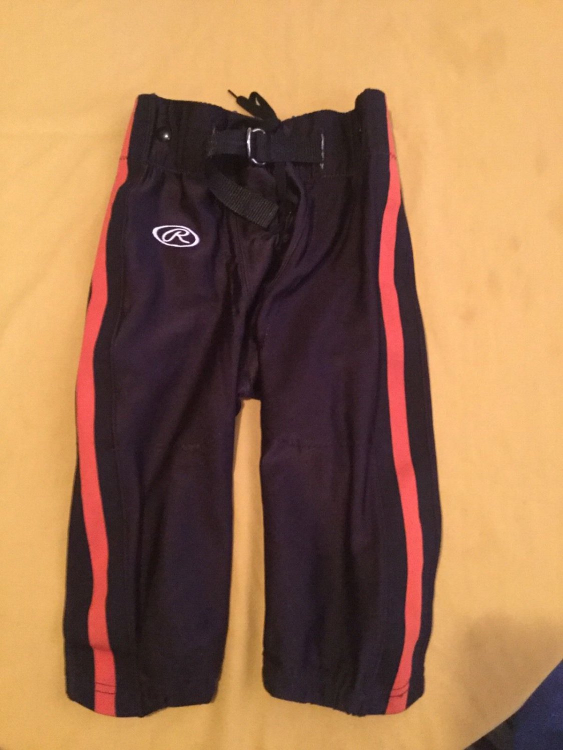 Boys Youth Large Rawlings football pants black orange pipping practice