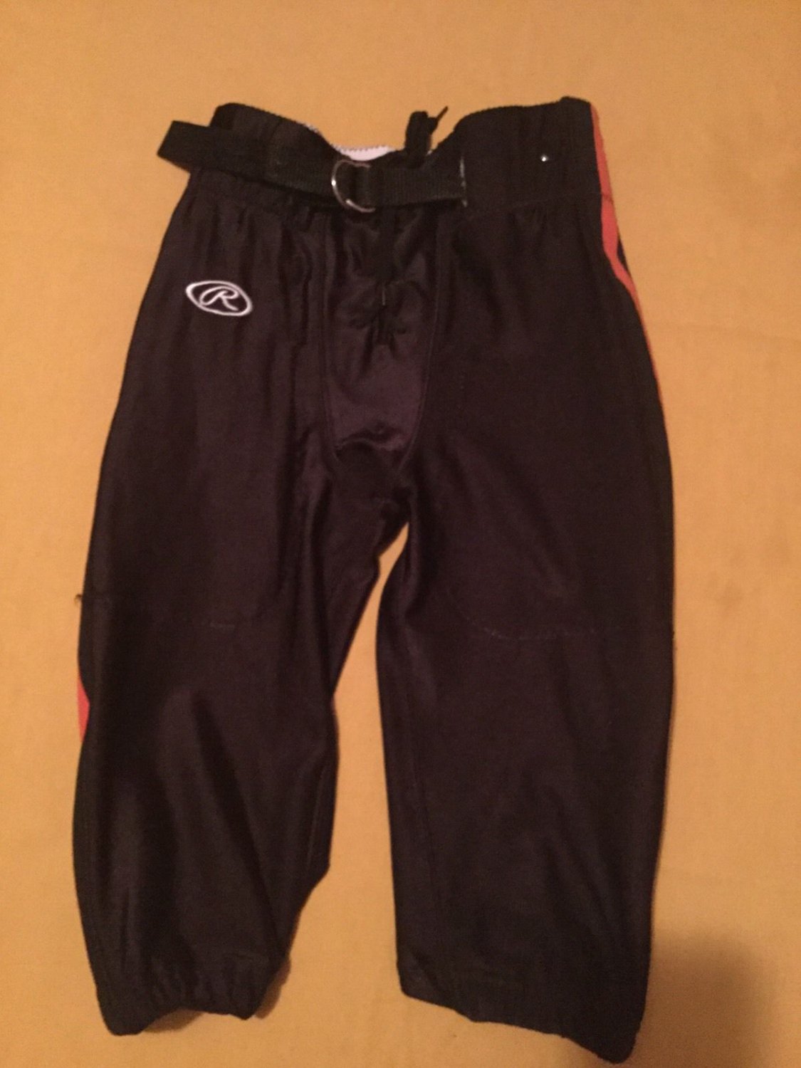 Boys Youth Large Rawlings football pants black orange pipping practice
