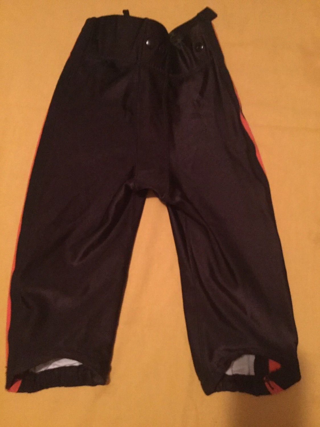 Boys Youth Large Rawlings football pants black orange pipping practice