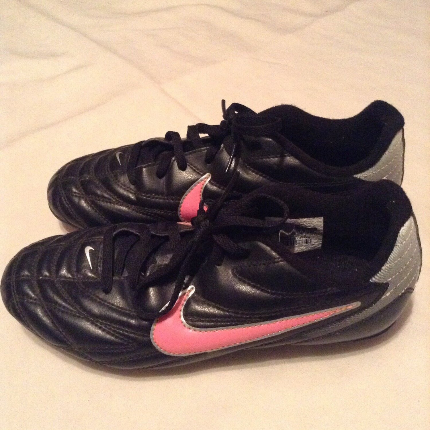 Nike shoes Size 4.5 soccer baseball softball cleats sporting goods black pink