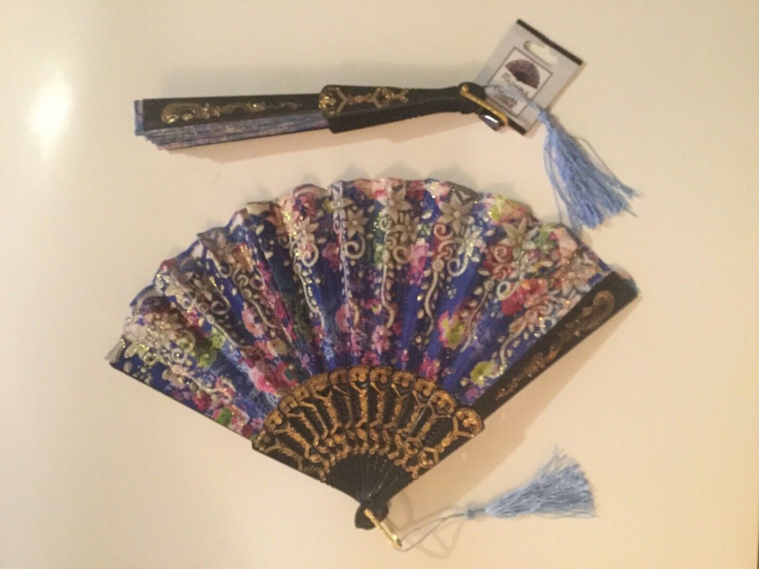 2 floral hand fans foldable cloth metallic tassel 9 in plastic new