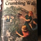The Clue in the Crumbling Wall by Carolyn Keene