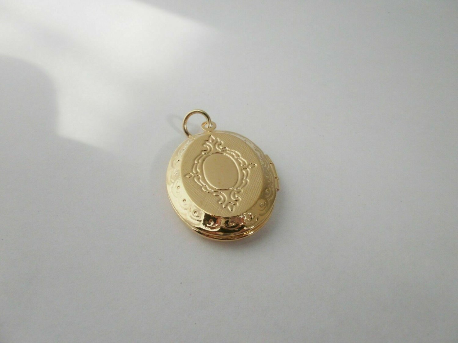 24k gold plated oval locket lifetime warranty