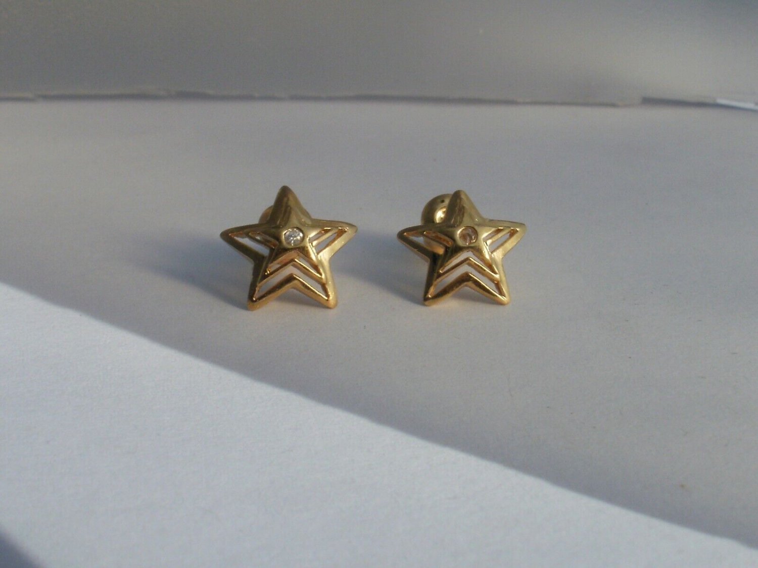 24k Gold overlay star post earrings Lifetime guarantee Brand New