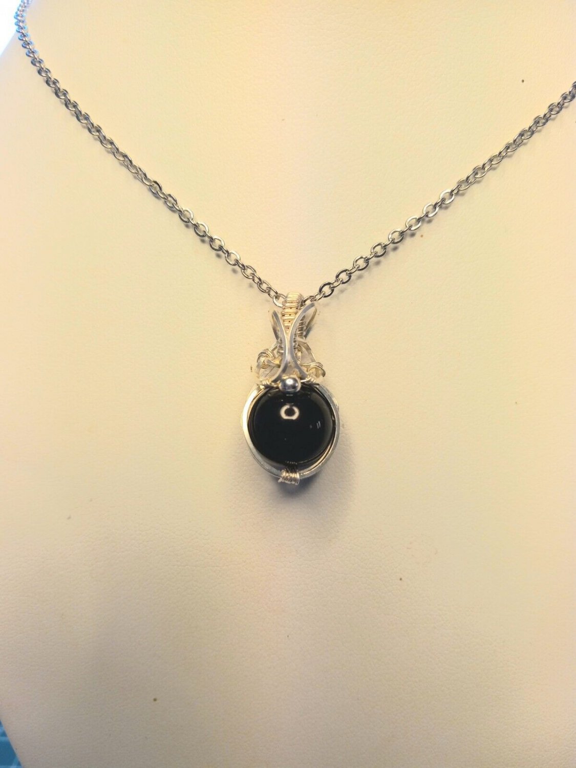 Hand made sterling silver wire wrapped Onyx pendant