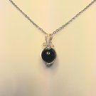 Hand made sterling silver wire wrapped Onyx pendant