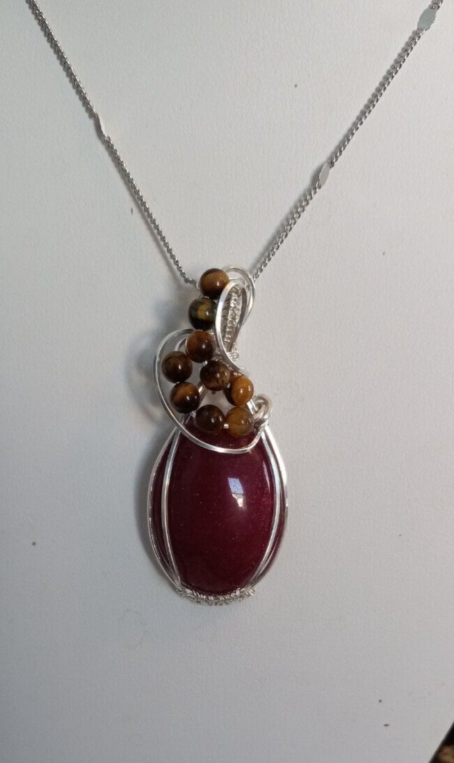 Sterling Silver Wire Wrapped Carnelian Pendant with tiger eye stones
