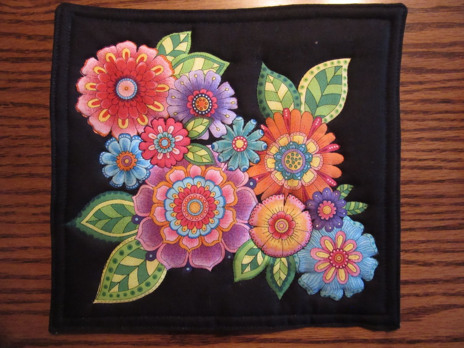 Bright Floral Design on Black Pot Holder or Hot Pad