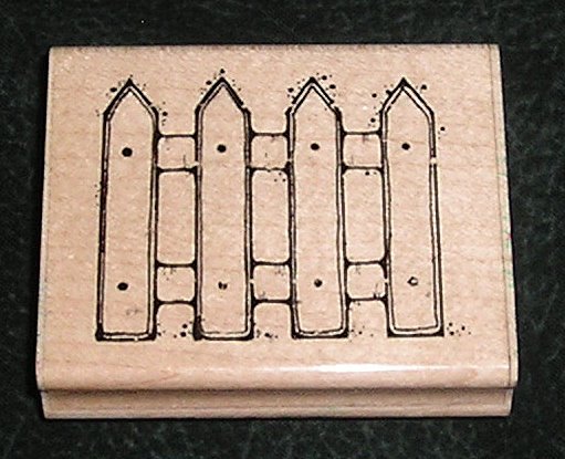 Rubber Stamp Mounted On Wood Garden Fence By D.O.T.S.