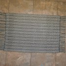 Hand Woven Rag Rug. Multicolored in shades of Greens, and Tan