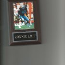 RONNIE LOTT PLAQUE OAKLAND RAIDERS FOOTBALL NFL GAME ACTION