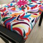 Vintage stool upholstered with exclusive Otomi fabric.