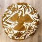 Round gold and off white Otomi pouf