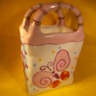 BELLA CASA-PORCELAIN VASE-  HAND PAINTED-SHAPED LIKE A BAG- BUTTERFLY- BEAUTIFUL