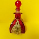 RED SEXY PERFUME BOTTLE- WITH GOLD TASSELS-VERY PRETTY-BEAUTIFY YOUR VANITY