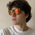 Black frame orange mirror lens sunglasses Y2K streetwear vibe