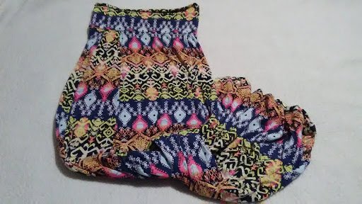 Women's pull on multi-colored Skirt (Size small 3-5) with bottom slit