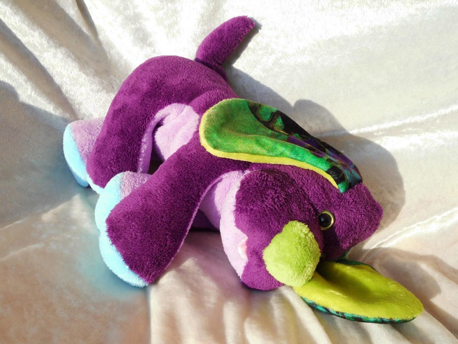 stuffed purple dog