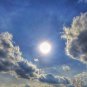 The Sun in the sky. Mysterious clouds. 2 images Framed. Mathias Zoneu