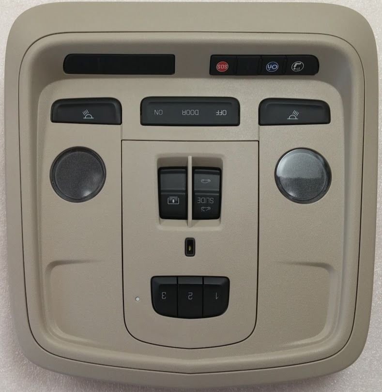 XTS overhead console. HomeLink Garage Door Opener, OnStar, Sunroof. Tan. NEW