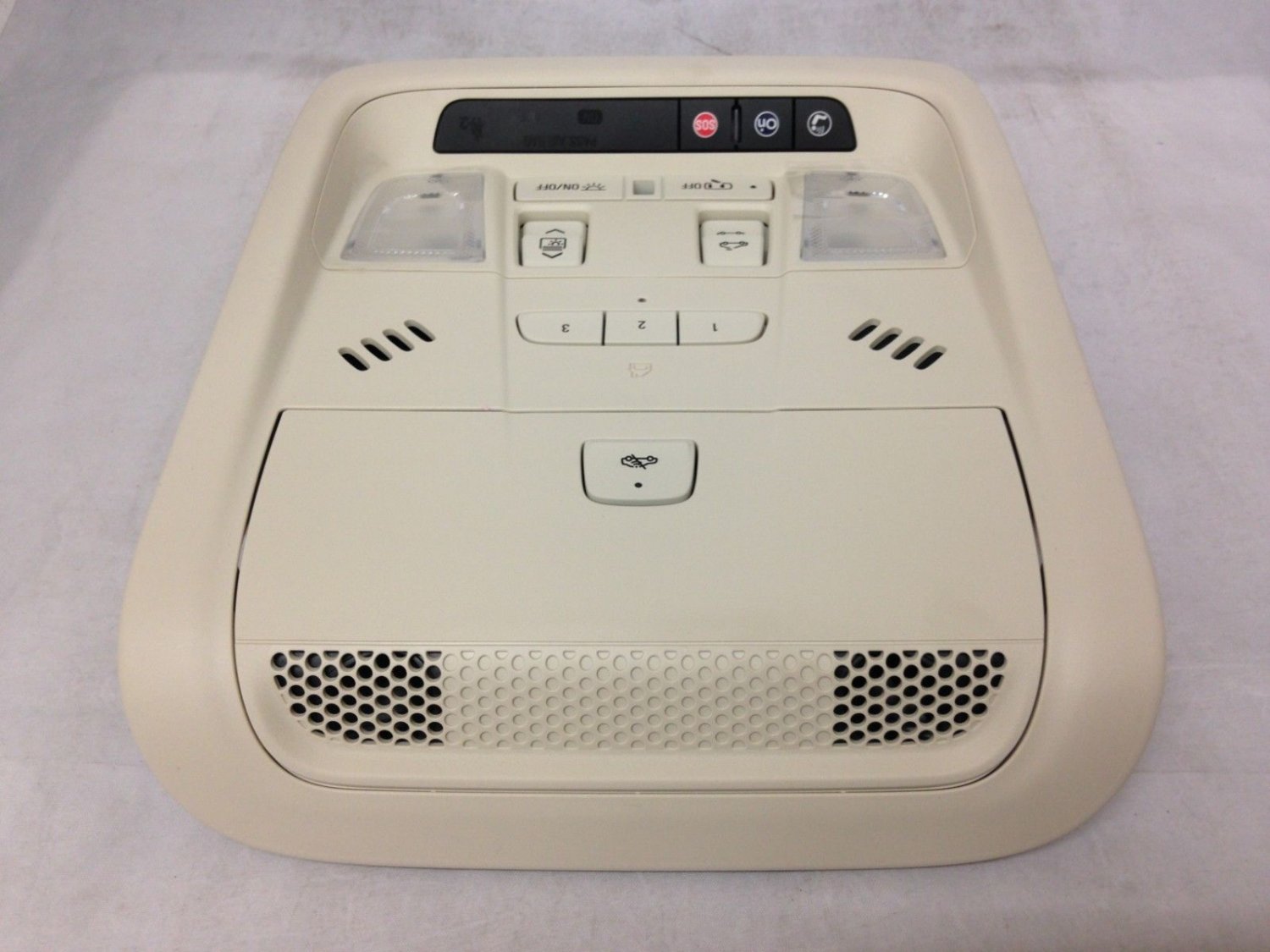 XT5 overhead console. HomeLink Garage Door Opener, OnStar, Sunroof. Lite Wheat