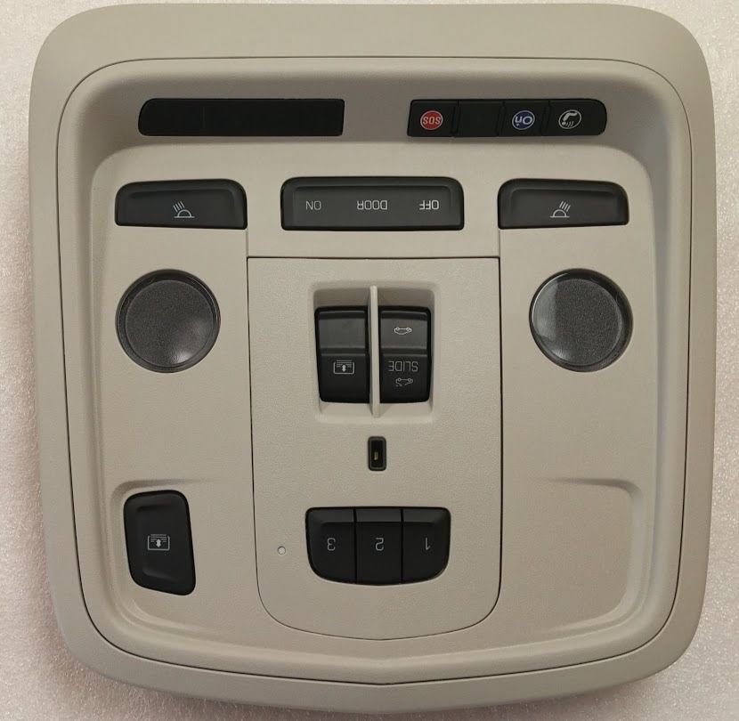 XTS overhead console. HomeLink Garage Door Opener, OnStar, Sunroof. Light Tan