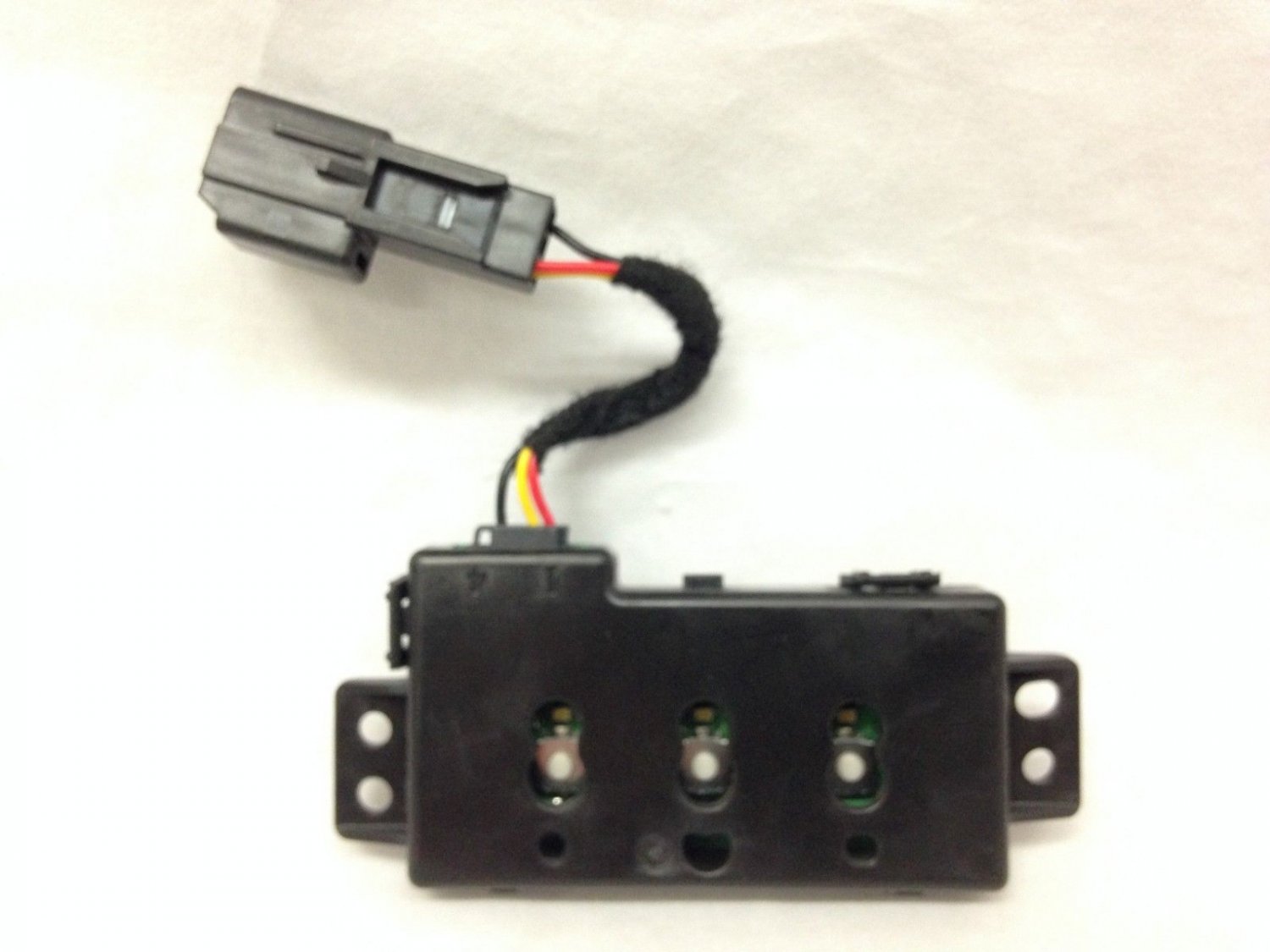 GM HomeLink garage door opener transmitter assembly module. Console mounted