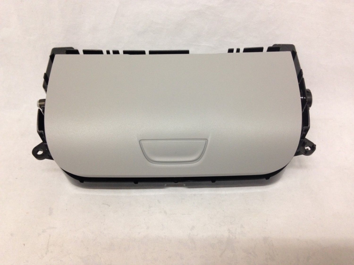 Acadia overhead console trim piece with sun glasses storage compartment.Ash Gray