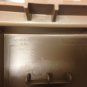 XT5 overhead console trim piece with theft deterrent disable switch. Maple Sugar