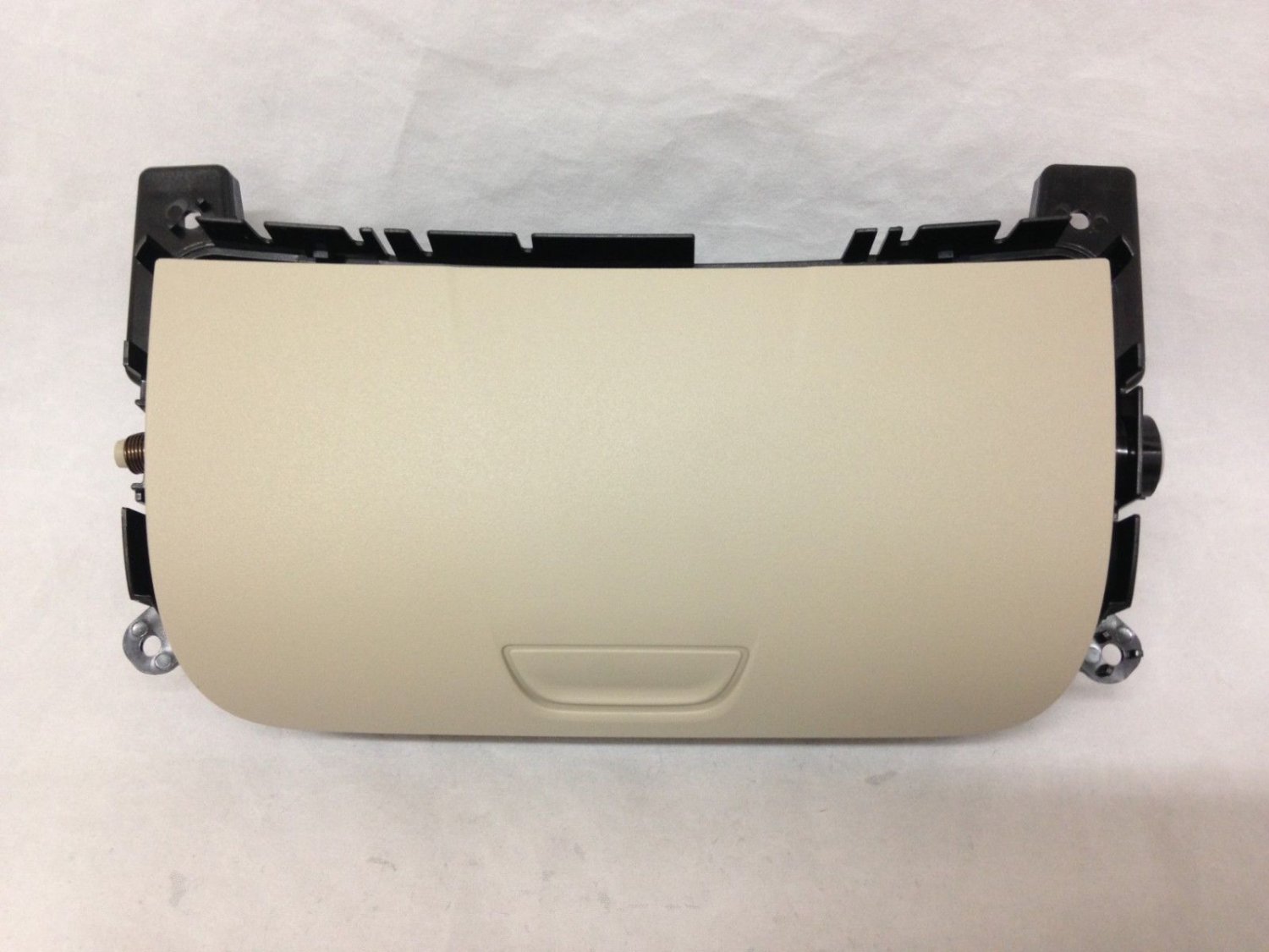 Acadia overhead console trim piece with sun glasses storage compartment. Shale