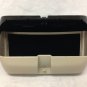 Acadia overhead console trim piece with sun glasses storage compartment. Shale