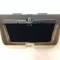 Acadia overhead console trim piece with sun glasses storage compartment. Shale