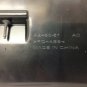 Acadia overhead console trim piece with sun glasses storage compartment. Shale