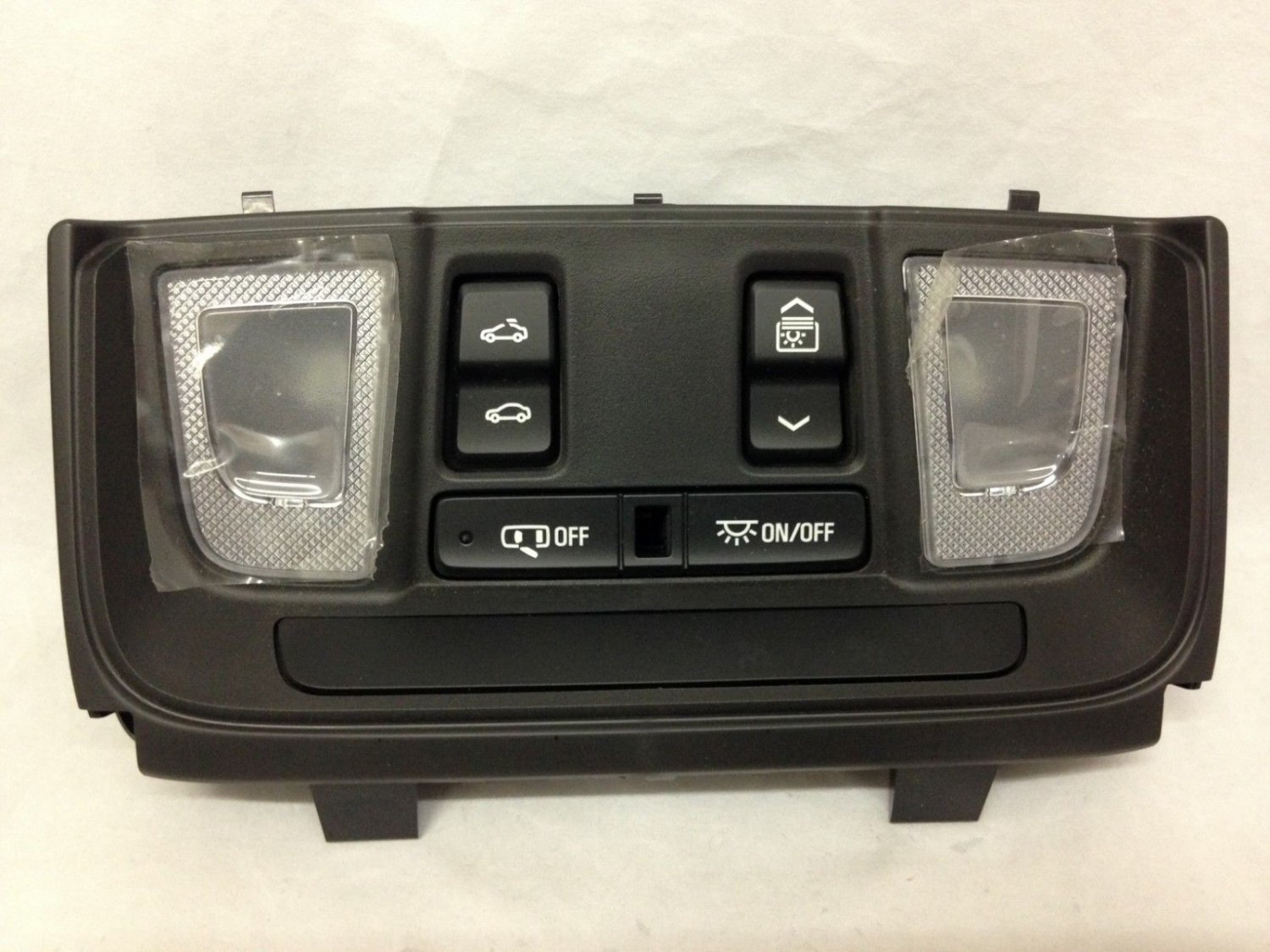 XT5 overhead console switch and light assembly. Has sunroof controls. Jet Black