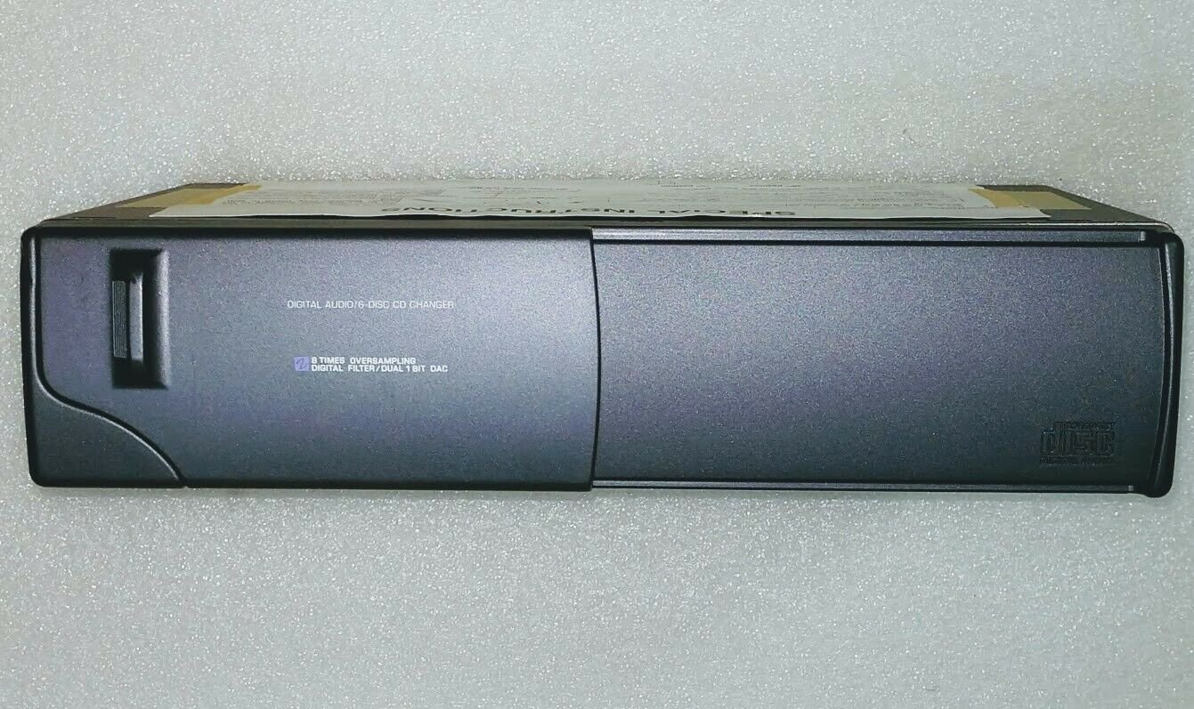 Ford CD6 remote CD Changer. OEM factory original. For select 1995+ vehicles