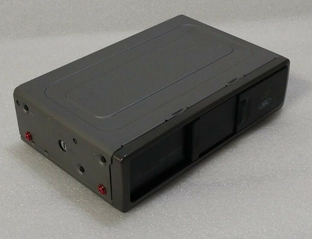 Ford CD6 remote CD Changer. OEM factory original. For select 1999+ vehicles