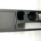 Cadillac XT4 center floor seat console cupholder leather & plastic trim piece
