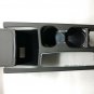 Cadillac XT4 center floor seat console cupholder leather & plastic trim piece