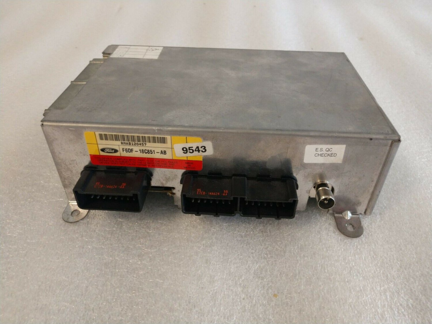 OEM factory original tuner receiver module for Taurus Sable. Remanufactured